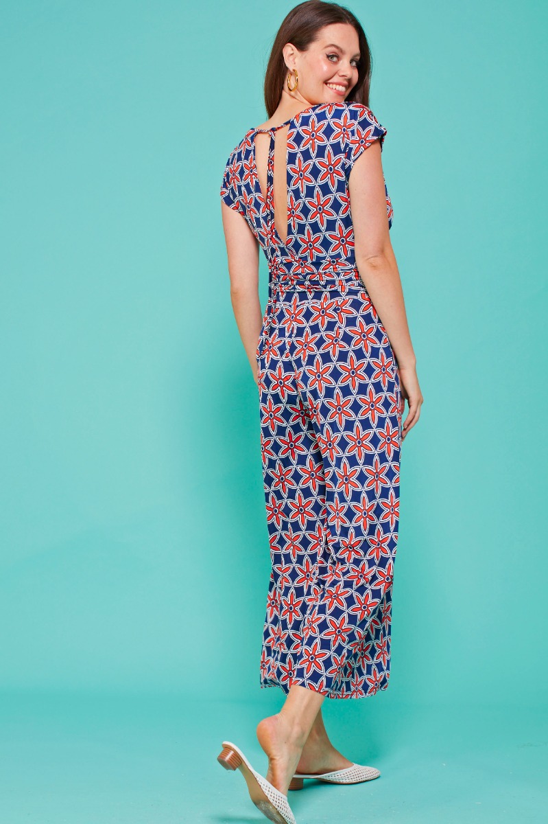 TASHA JUMPSUIT STAR ORANGE PRINT